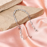 This stylish zircon bracelet by Joy Of Silver is made from 925 sterling silver and features a unique design with sparkling zircon stones. The bracelet is perfect for adding a touch of elegance to any outfit. It's also a great gift for a special occasion.